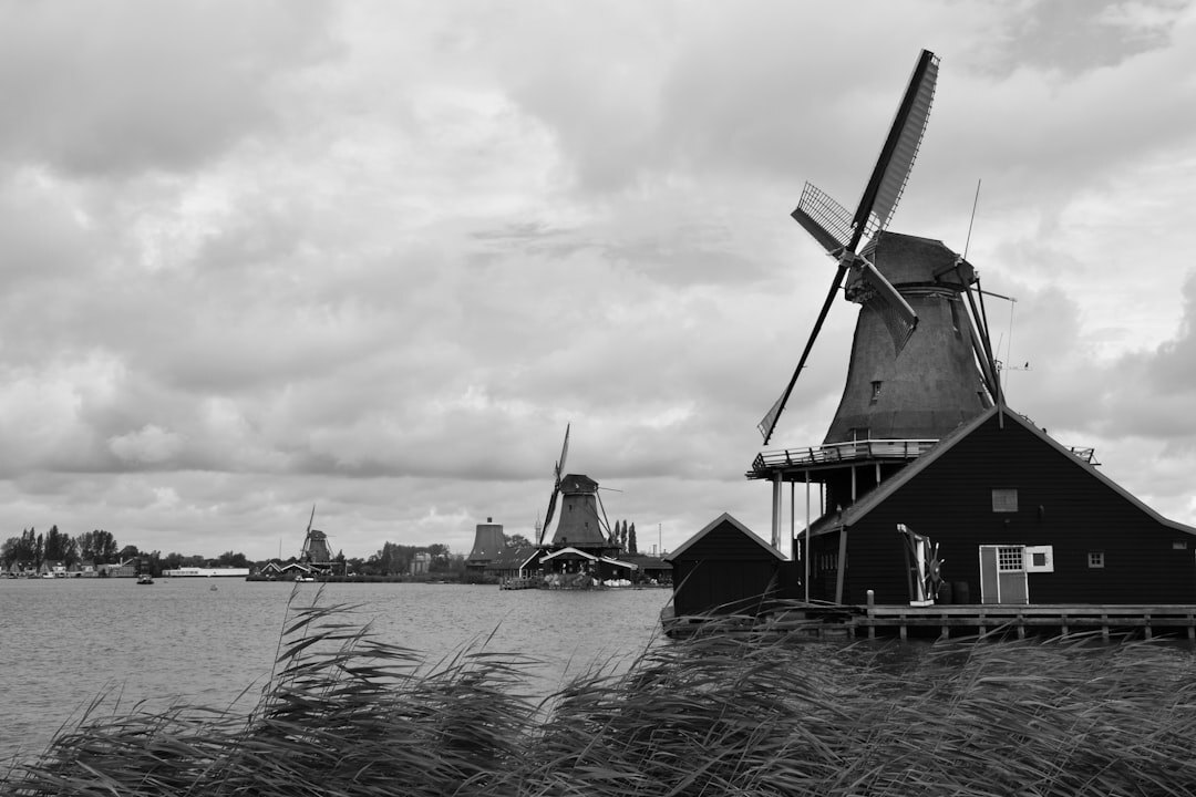 dutch windmill landscape with old book